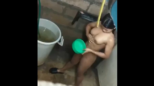 Watch Recording a Busty Latina Taking Shower