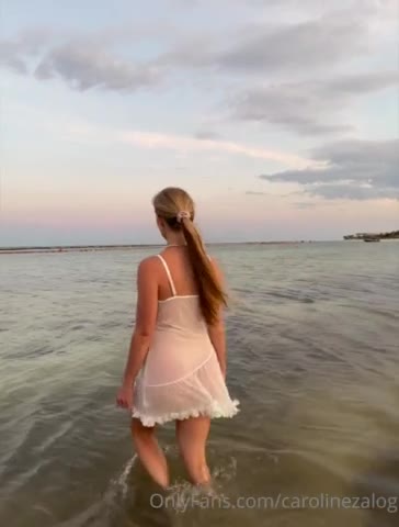 Watch Caroline Zalog’s Wet Sheer Lingerie Tease