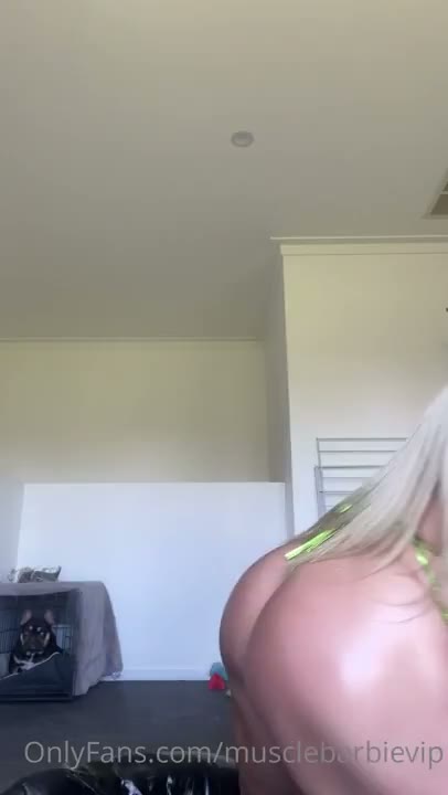 Watch Oiled Muscle Barbie Flaunts Her Fit Body & Rides A Dildo